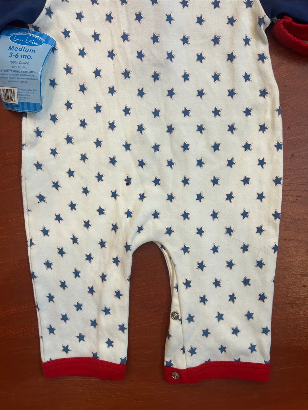 Bon Bebe Cream One-Piece with Navy Stars and Red Trim